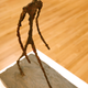 "Homme Traversant une place par un matin soleil," by Alberto Giacometti